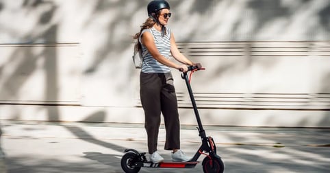 Woman riding an electric scooter