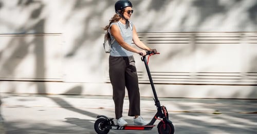 Woman riding an electric scooter