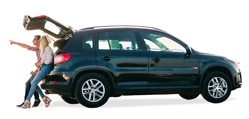 Couple in car with auto coverage