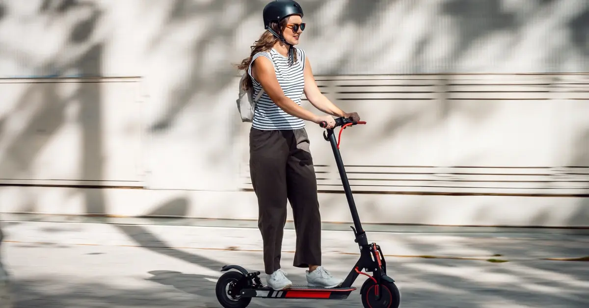 Woman riding an electric scooter